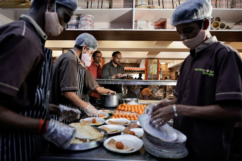 You are currently viewing India's services growth eases in September as demand cools, PMI shows