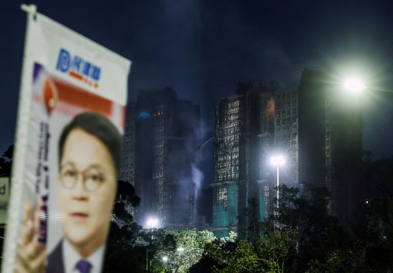 You are currently viewing Hong Kong faces low election turnout as residents mourn deadly fire