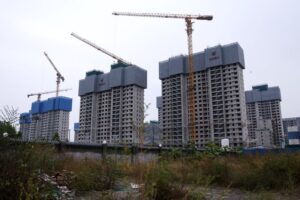 Read more about the article China's home prices slide further in November