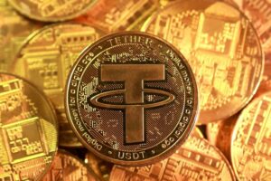 Read more about the article Tether says it bought 27 tons of gold in fourth quarter
