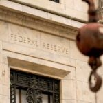 Read more about the article Fed holds rates steady as expected, but sees elevated inflation