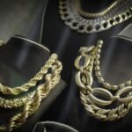 Read more about the article Gold plunges as bets of a more hawkish Fed chair rise; set for best month since 1980