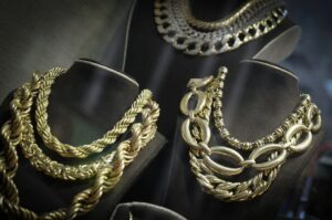 Read more about the article Gold plunges as bets of a more hawkish Fed chair rise; set for best month since 1980