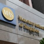 Read more about the article Singapore’s Central Bank Stays on Hold as It Raises Inflation Forecasts