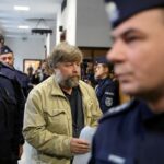 Read more about the article Belarus frees Polish journalist, Warsaw frees Russian archaeologist in prisoner swap