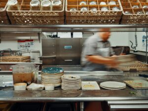 Read more about the article The immigration crackdown and tepid interest among teens make it harder than ever for restaurants to find someone to wash the dishes