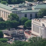 Read more about the article Fed holds steady in Warsh’s debut; analysts see hawkish shift