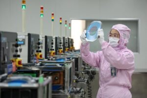 Read more about the article AI Boom Keeps Asian Factory Activity Humming Despite Cost Pressures